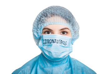 Portrait of ill woman wearing medical uniform and mask with coronavirus text isolated on white background. Coronavirus and health care concept