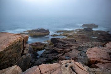 Fototapeta na wymiar Long exposure shot of Thunder Hole, located on the east coast of Acadia National Park, Maine (USA)