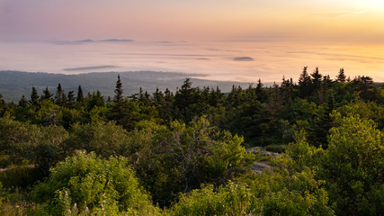 Sunrise moments at the peak of Cadillac Mountain, located in the centre of Mount Desert Island, Maine, USA