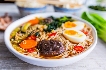 Ramen soup with noodles and traditional ingredients.
