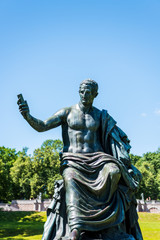 A statue in The Catherine Palace, a Rococo palace located in the town of Tsarskoye Selo, 30 km south of St. Petersburg, Russia. It was the summer residence of the Russian tsars.