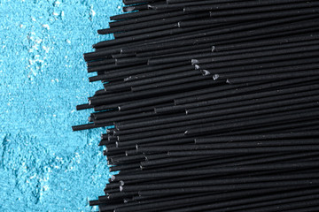abstract black pasta on blue background