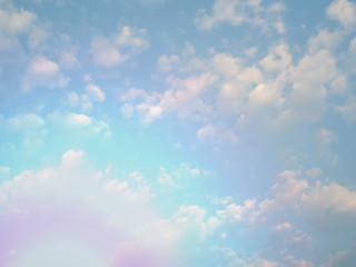 puffy fluffy clouds in spring evening with blue sky horizontal , abstract nature background