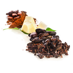 Cocoa beans and powder, cacao butter and cacao nibs isolated on a white background.