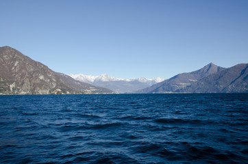Lake Como with Snow-capped Mountain in Lombardy, Italy.