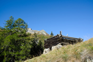 Fototapeta na wymiar Old Rustic House and Mountain in Ticino, Switzerland.