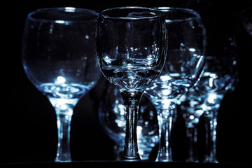 Empty  glasses for drinks on dark background