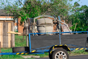 A concrete mixer transported on a trailer