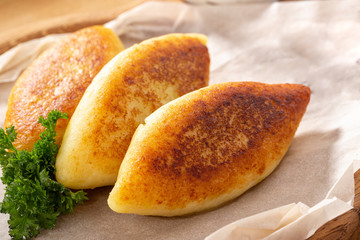 Potato patties (zrazy) Stuffed with minced meat, served with sour cream and tomato sauce. Crisp potato cutlets with meat, mushrooms and cheese. Traditional Russian food Zrazy