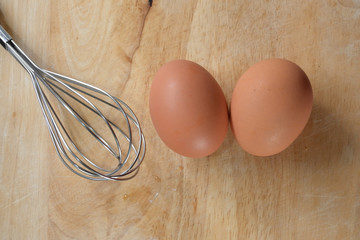 hen egg put on wood cutting board in kitchen prepare cooking