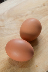 hen egg put on wood cutting board in kitchen prepare cooking