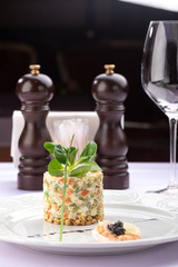 Delicious fresh salad. Traditional russian salad 