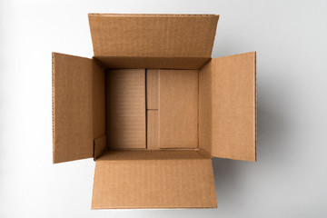 Square blank box opened on white background. Directly above