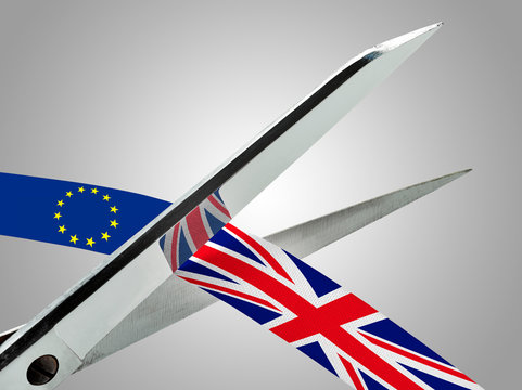 Scissors cutting a ribbon flagged with UK and European flag