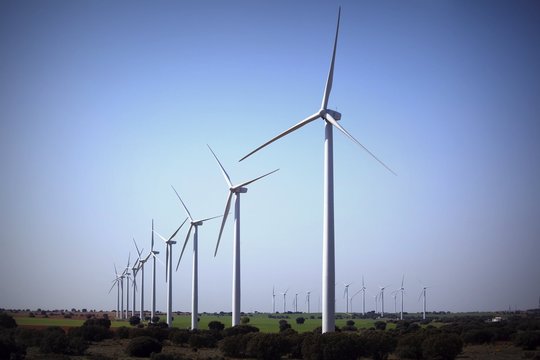 Win Turbines On Land Against Clear Sky