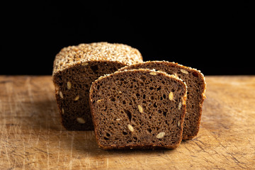 Slices of fresh bread ready to be used. Fresh homemade baked bread and sliced bread. bread - freshly baked tasty pastries, menu concept. food background. copy space
