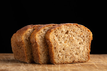 Slices of fresh bread ready to be used. Fresh homemade baked bread and sliced bread. bread - freshly baked tasty pastries, menu concept. food background. copy space