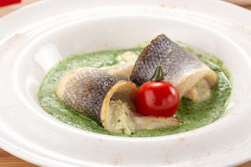 Oven-baked Sea bass. grilled fish.