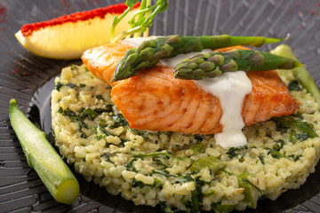 Salmon steak with vegetables. Grilled salmon steak with lemon and vegetables. Fish meal with fresh vegetable.