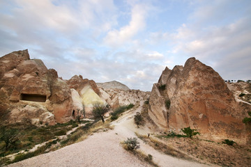 Fototapeta premium Unusual stones from volcanic rocks in the Red Valley near the village of Goreme in the Cappadocia region in Turkey.