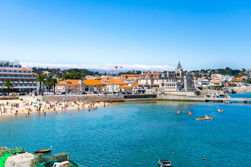Aerial view  of a beach in Cascais city near Lisbon, Portugal. seaside town with beach, port and coastline panoramic view.
