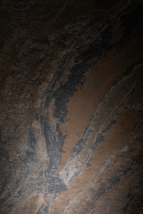 top view of textured and dark granite surface