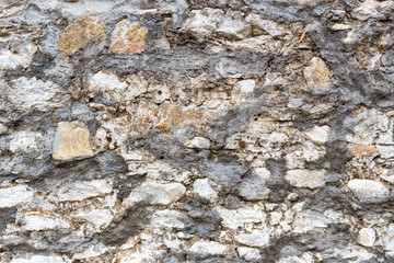 The texture of the stone wall close-up