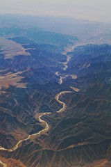 Aerial view of the Colorado River seen from an airplane window