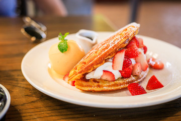 Waffle Breakfast with strawberry and ice cream