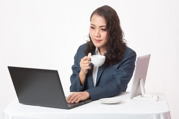 Beautiful young executive with her work and coffee