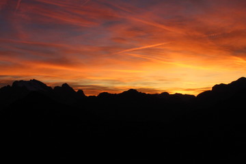 Obraz premium beautiful sunset view on the top of mountain