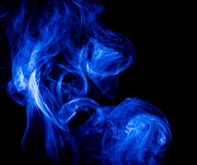 Obraz premium Blue smoke on black background