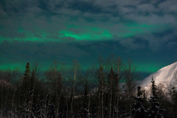 Northern lights on the background-night mountains