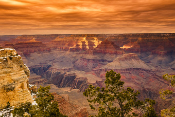 Orange sunset on the Grand Canyon during winter 