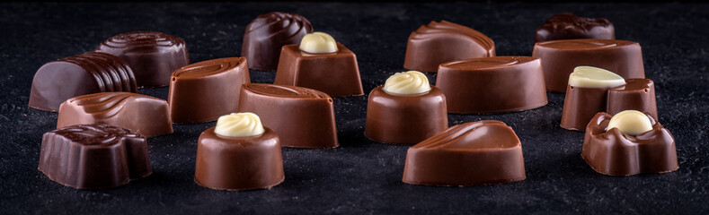 Belgian Chocolate pralines on dark background