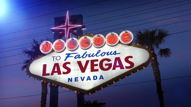 Public welcome to fabulous Las Vegas road Sign at night in 4k