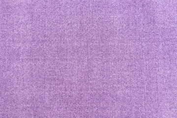 Detail of a purple fabric texture background.