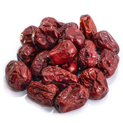 Large dates on a white isolated background. Plum and dried fruit food for your website design. kitchen theme