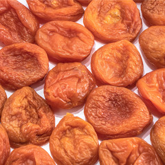 Dried apricots on a white isolated background. Delicious raisins food yellow for your design for the site. kitchen theme