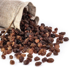 Raisins peeled on a white isolated background. Food grape  brown delicious for your design for the site. kitchen theme