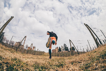 Man trail running in the vineyards