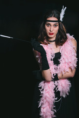 vintage Gatsby 20s fashion style ,make up and hairstyle. Soft Selective focus of model young woman,...