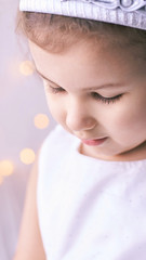 Little cute girl sale portrait. Photography of luxury female child. Happy winner emotion. Fresh person face. Kid eyes