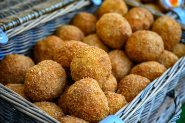 Traditional street food in UK, stuffed Scottish eggs with breadcrumbs