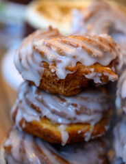 Scottish cream choux buns with white icing close up