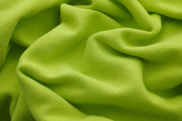 Lime green wrinkled fabric texture background