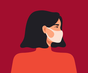 Young asian woman wears a breathing mask to protect against coronavirus and air pollution. The concept of preventing the spread of viral infectious diseases.