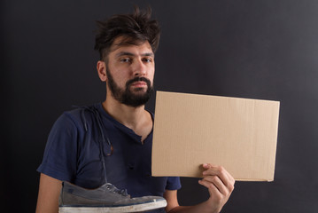 homeless tramp with a sign