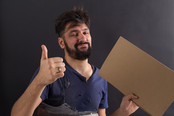 homeless tramp with a sign
