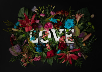 Colorful love background. Floral Greeting card. Happy Women's Day. Spring flower flat lay holiday...